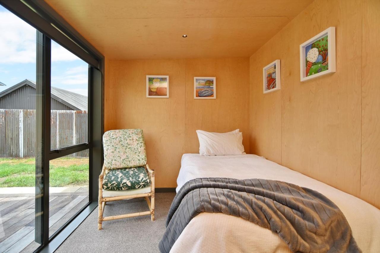Beachfront Bach - Homes Holiday home *